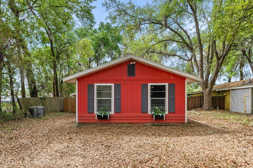 One or more photo(s) has been virtually staged. Meet “Lil Red”—a charming Gainesville gem full of warmth, character, and everyday comfort. Step inside this 2 bedroom, 1 bath home to a light-filled layout designed for both relaxing and gathering, with comfortable living spaces that just make sense. The kitchen offers plenty of room to cook, connect, and create memories, while the  dining room has plenty of room to gather around. The two bedrooms provide peaceful retreats at the end of the day.  Enjoy your new floors (NO carpet anywhere) and fresh interior paint.Out back, enjoy a spacious, fenced in back yard with room to garden, entertain, or simply unwind under the Florida sky. Full laundry room with washer and dryer included.  And the best part? NO HOA to hound you. Whether you're looking to own your very own home, a smart investment, or a place with heart—“Lil Red” is one you won’t want to miss.