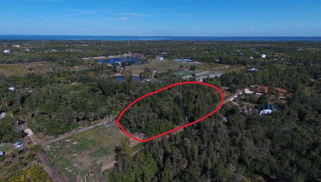 Photo of 7224 Coccoloba Way, Bokeelia, FL 33922 (MLS # D6147556)