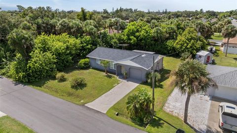 Photo of 4850 Neptune Road, Venice, FL 34293 (MLS # A4665364) Photo of 4850 Neptune Road, Venice, FL 34293 (MLS # A4665364)