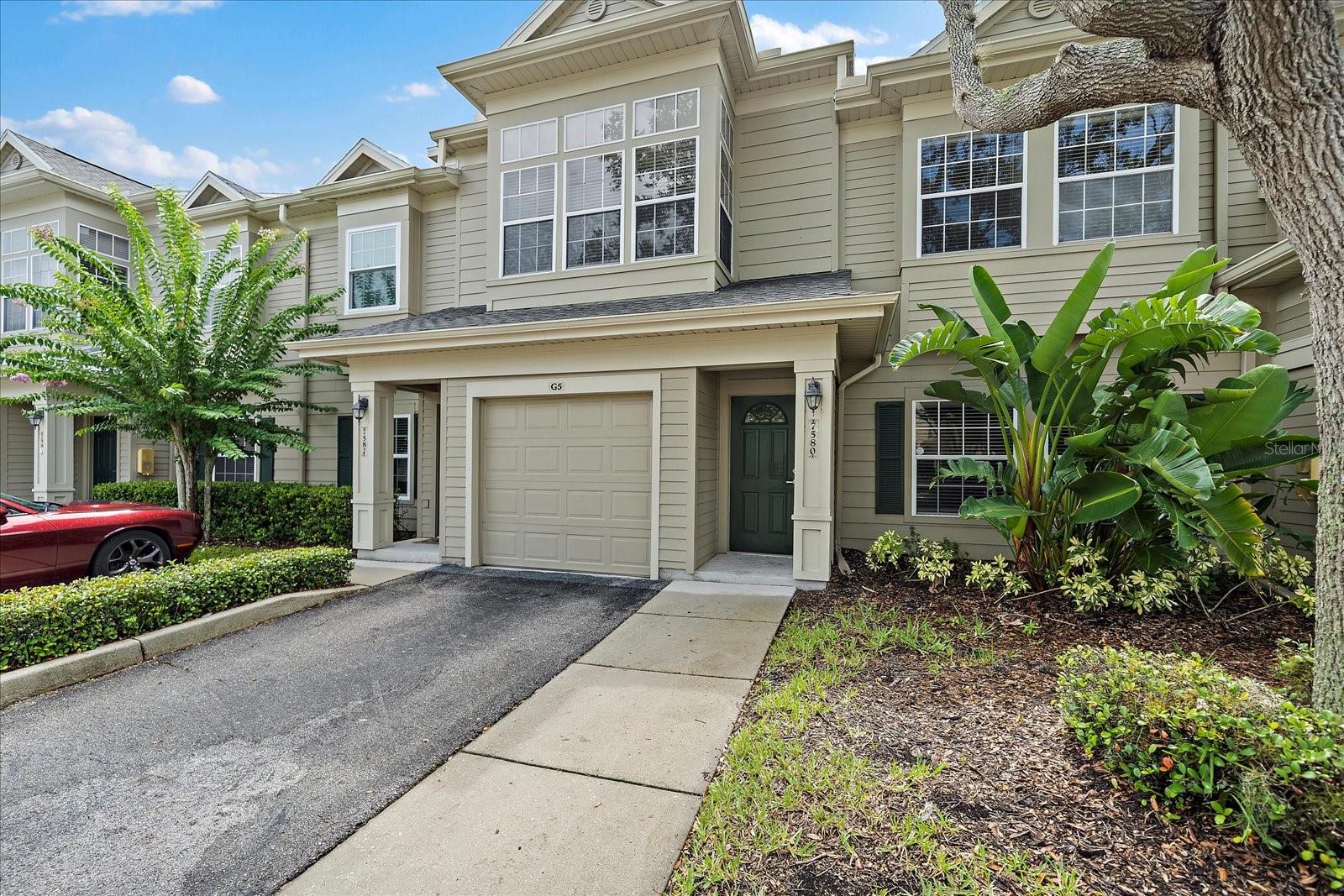 One or more photo(s) has been virtually staged. HOW LOW CAN YOU GO? LOW HOA fees that is! Breath of fresh air for a Sarasota townhome that has such low operating costs!
Welcome to 7580 Plantation Circle, a rare opportunity in the gated community of Carolina Landings at University Place. This move-in ready 3-bedroom, 2.5-bathroom townhome offers 1,282 square feet of well-designed living space and includes a rarely available 1-car attached garage measuring 20x9—a highly desirable feature in this maintenance-free enclave.
Freshly painted and thoughtfully refreshed throughout, this two-story residence features NO carpeting anywhere (only a touch in the closets), with tile on the main level and in all bathrooms, and rich laminate wood flooring on the stairs and in all three bedrooms. A brand-new Goodman 15 SEER 2.5-ton A/C unit was installed in NEW in May 2023, and the NEW METAL ROOF was replaced on this building in 2021. SEE attached Wind Mitigation report as well in MLS. The roads are also scheduled to be re-paved in mid-July, adding even more value and curb appeal. The home shows beautifully and is truly move-in ready.
Enter through your private front door or directly from your attached garage into a light-filled main floor featuring a full-sized dining area, spacious kitchen with black GE and GE Profile appliances, dark granite countertops, disposal, and plenty of room to add a high-top table or island. The adjacent living area opens to a screened lanai with peaceful greenery views, perfect for morning coffee overlooking the sunrises from your lanai, or a quiet unwind at day’s end.
The layout offers a rare downstairs half bath for guests and an under-stair, L-shaped storage closet (6x7)—perfect for storing luggage, cleaning supplies, or bulk items. The shelving inside the closet conveys with the home.
Upstairs, you'll find all three bedrooms, including a spacious primary suite with a custom walk-in closet (7x7) outfitted with built-in drawers and shelving. The ensuite bathroom features dual sinks, granite countertops, a tub/shower combo, and a remote-controlled lighted ceiling fan. The second and third bedrooms also feature hardwood floors—Bedroom 2 includes two side-by-side closets, while Bedroom 3 offers a generous walk-in closet with shelving and multiple windows for abundant natural light. A full guest bathroom with tub/shower combo and a hallway linen closet complete the upper level.
Additional upgrades include a security system, newer water heater (installation date TBD), low HOA fees, and the comfort of concrete block construction, low taxes, no CDD fees, and no flood insurance required.
Carolina Landings offers resort-style amenities including a heated community pool, fitness center, clubhouse, scenic walking trails, and manicured tropical landscaping. The community’s unbeatable location puts you minutes from the UTC Mall, Benderson Park, Whole Foods, I-75, and a wide variety of shopping, dining, and entertainment options. Whether you're a first-time homebuyer, seasonal resident, or simply seeking stress-free Florida living in a prime Sarasota location, this townhome checks all the boxes.
Rare 3-bedroom with attached garage, new roof, new A/C, and impeccable condition—don’t miss your chance to own at 7580 Plantation Circle.