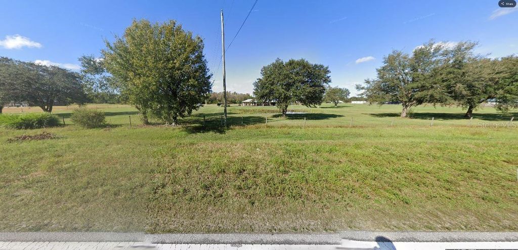 Photo of Old Grade Rd, Polk City, FL 33868 (MLS # O6266207)