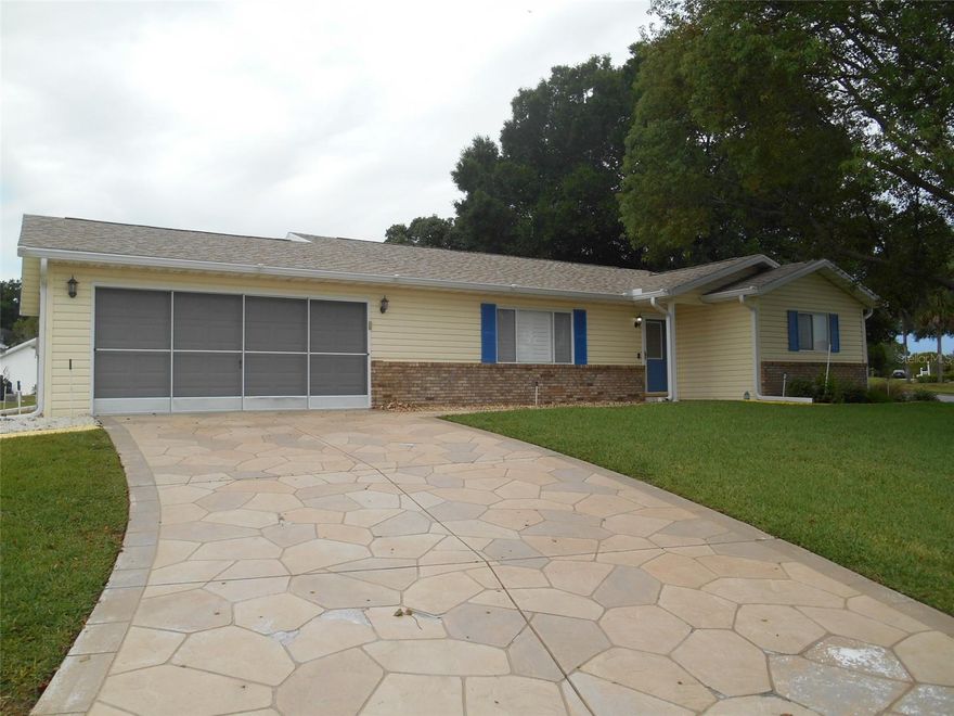 This unfurnished home features plantation shutters, waterproof luxury vinyl plank flooring and ceramic tile in the kitchen, lanai, and master bath. No carpet.  The kitchen has stainless steel appliances, along with plenty of cabinet and counter space. The master bedroom has 2 walk in closets featuring a 2 tier hanging system.  Guest bath has a fully renovated walk-in shower.  The Florida room can be utilized as an office or TV room.  Enclosed lanai opens up to a screened patio/birdcage great for entertaining.  A connected open patio great for grilling or sunbathing.  Community center, pool, and Pickleball courts are just on block away.  Rent includes association fees, lawn care, and exterior pest control. This home is located in Spruce Creek South just 2 miles north of The Villages.   This is a must see home.