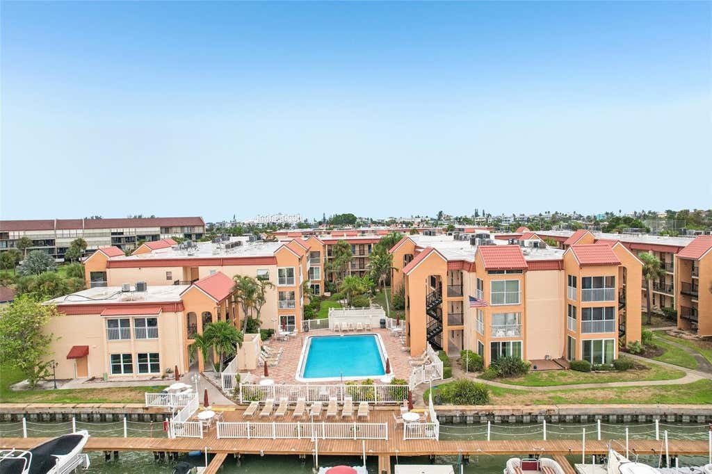 Photo of 8911 Blind Pass Road #104, St Petersburg, FL 33706 (MLS # TB8534199)