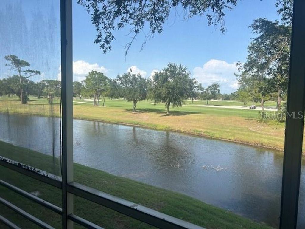 Photo of 7461 W Country Club Drive N #201, Sarasota, FL 34243 (MLS # A4649102)