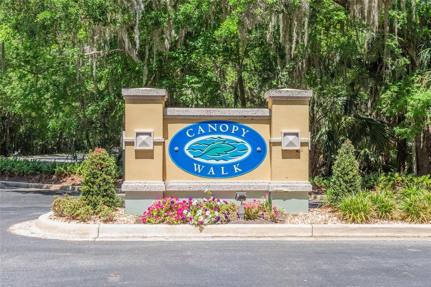 Located in one of Palm Coast’s most sought-after condominium communities, Canopy Walk, this top-floor residence offers elevated living with high cathedral ceilings and tranquil lakefront views. Featuring two bedrooms and two baths, the open layout is filled with natural light, creating a bright and airy atmosphere ideal for both relaxing and entertaining. The split floor plan provides ideal separation, with a guest bedroom and bath conveniently located near the kitchen and entry—perfect for easy access and privacy for visitors. The primary suite is thoughtfully positioned to capture serene lake views and features a spacious en-suite bath with dual vanities and generous walk-in closets, offering comfort, functionality, and a private retreat. The kitchen with dinette flows seamlessly into the great room, creating an open, connected space where you can cook, entertain, and enjoy beautiful lake views all at once. Tile flooring throughout enhances the clean, cohesive design, giving the condo a polished, modern feel. With a versatile layout and neutral finishes, the possibilities to personalize and make it your own are truly endless. Enjoy the amenities of Canopy Walk; Community Pool, Clubhouse, Walking and Bike trails, Gazebo, Dock Intracoastal Waterway. Close to Shopping, Restaurants, Golf, Beach, European Village, etc.