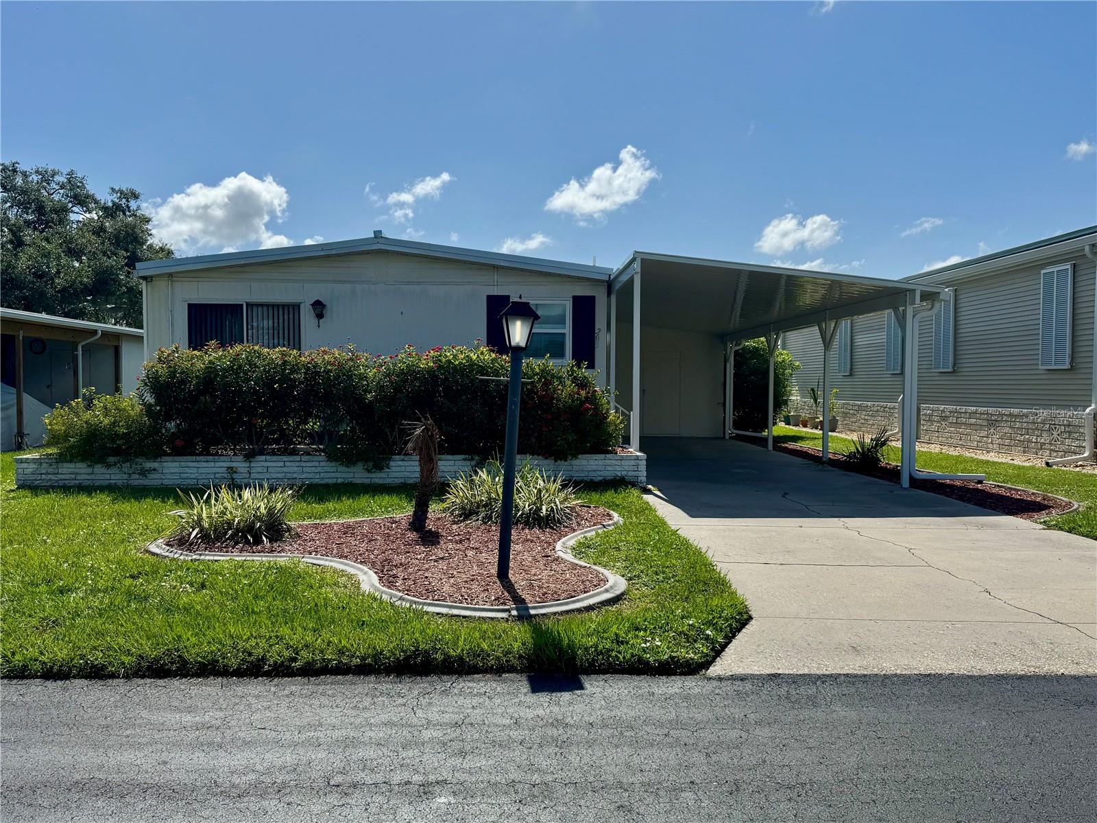 Your Dream Retreat Awaits in a Lively 55+ Paradise!
Step into vibrant living with this charming 2-bedroom, 2-bathroom furnished 1978 mobile home, perfectly nestled in a dynamic 55+ community sprawling across 223 acres of breathtaking beauty, framed by 8 shimmering lakes and lush native trees. This gem shines with modern upgrades: a 2015 HVAC system to keep you cool, a sturdy 2022 metal roof, a brand-new 2024 carport roof, and a 2019 hot water heater for worry-free comfort. Plus, the handy utility room comes complete with a washer and dryer—talk about convenience!
Dive into an active, fun-filled lifestyle with incredible amenities at your fingertips: two lively clubhouses, an activity center buzzing with energy, two heated pools and soothing spas, an exercise room with aerobics classes, 6 tennis courts, 4 pickleball courts, shuffleboard, bocce, billiards, darts, and even a relaxing sauna. Connect with friends at festive holiday parties, weekly coffee hours, dances, and a variety of clubs that spark your passions. Love the outdoors? Enjoy free irrigation water and two boat ramps for lake adventures.
Best of all, you’re just a short hop from world-class golf courses, pristine beaches, and endless shopping and dining options—everything you need for the ultimate Florida lifestyle! With 974 homes in this scenic, amenity-packed community, this mobile home is your ticket to a life full of excitement and relaxation. Don’t wait—call today to tour your new home and start living the dream! A recent 4pt report available for the buyer.