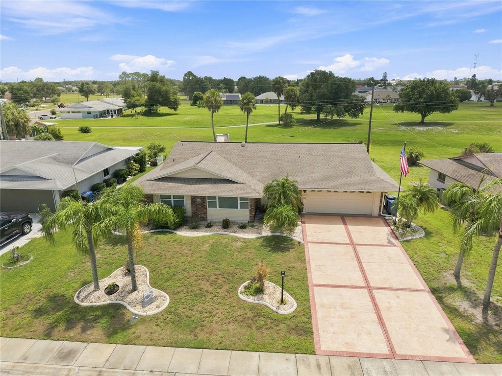Photo of 1405 Hacienda Drive, Sun City Center, FL 33573 (MLS # TB8532825)