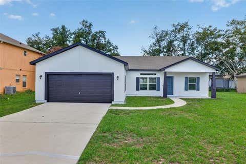 Photo of 306 Michigan Lane, Kissimmee, FL 34759 (MLS # TB8496518)