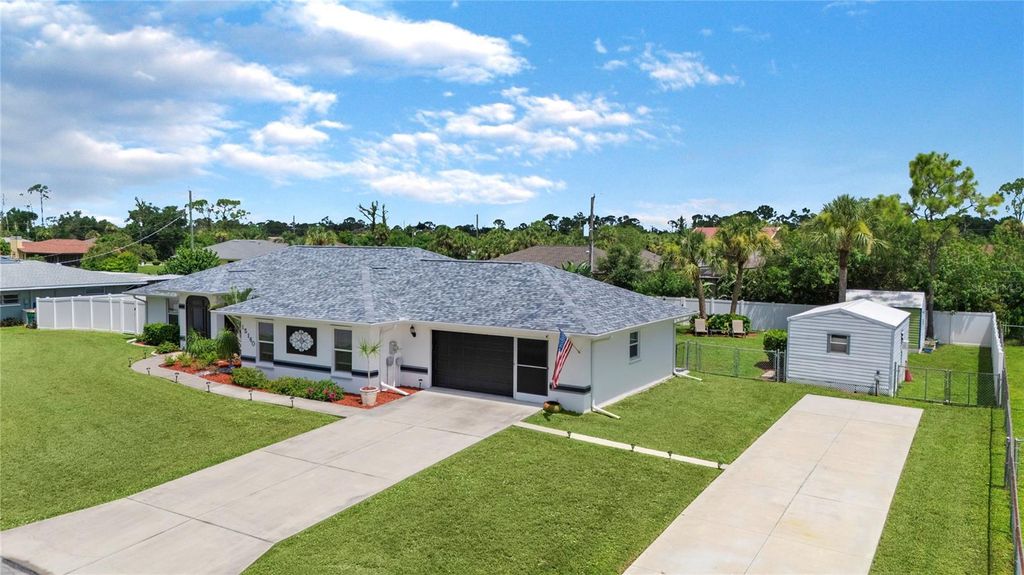 Photo of 15160 Buswell Avenue, Port Charlotte, FL 33953 (MLS # TB8416821)