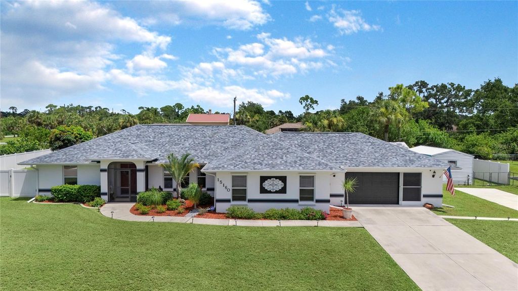Photo of 15160 Buswell Avenue, Port Charlotte, FL 33953 (MLS # TB8416821)