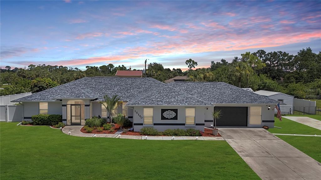 Photo of 15160 Buswell Avenue, Port Charlotte, FL 33953 (MLS # TB8416821)