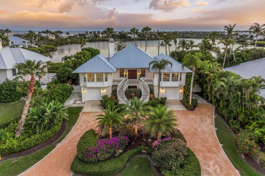 Welcome to 1678 Jose Gaspar Drive, a serene waterfront retreat tucked along the tranquil shores of “Hole in the Wall” Bay in the coveted Boca Grande Isles. This property boasts 96” of water frontage and offers an intimate, natural setting where mangroves, shorebirds, and calm waters create a true Old Florida backdrop.The protected bay is ideal for kayaking and paddle boarding, offering quiet waters to explore at your own pace while enjoying abundant native wildlife. It’s a nature lover’s paradise—private, picturesque, and beautifully unspoiled.
The 3400 sq foot home 4 bedroom, 3.5 bath home is filled with natural light and designed to capture water views from the living areas. An open layout with cathedral ceilings and a cozy stone fireplace creates an effortless flow for entertaining or relaxing, while large hurricane glass doors invite the outdoors in. The screened lanai offers views of the water and the living space that Florida is known for.  
The gourmet kitchen serves as the heart of the home, boasting quartz countertops, eat in dining, generous workspaces, and a breakfast bar. This Island retreat offers plenty of gathering areas which are perfect for hosting family and friends.
The primary suite on the main level provides a peaceful sanctuary with an elegant Master bath which includes, quartz countertops, dual sinks a walk in shower and soaking tub.  Perfect for relaxing after a day filled with outdoor activities.  
The lower level contains an additional living room, three additional guest rooms, two baths and easy access to the beautiful pool, spa and patio.  Perfect to entertain family and friends. Located in a gated community just minutes from the village of Boca Grande, with its charming shops, dining, and Gulf beaches, this property offers a rare opportunity to embrace quiet waterfront living in one of Florida’s most treasured island communities.