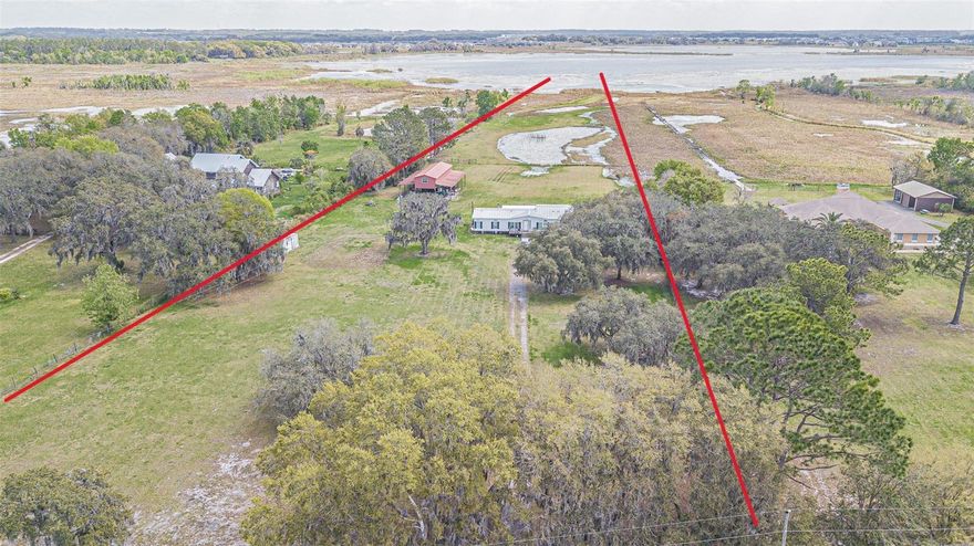 Welcome to paradise! Nestled in the heart of the Connected City, where innovation meets nature, lies a spectacular opportunity to claim your own slice of waterfront heaven. Behold, a mesmerizing 13-acre canvas of possibilities, boasting prime real estate along the shimmering shores of the picturesque King Lake. 

Imagine waking up to the gentle lullabies of nature, with the sun peeking over the horizon, casting its golden rays upon your private oasis. This isn't just any lakefront property – it's a sanctuary, a haven where dreams are built and memories are made. 

Let's talk about the land itself – a sprawling 13 acres of pure potential. Here, the possibilities are as endless as the tranquil vistas that stretch out before you. Whether you're envisioning a palatial estate fit for royalty or a cozy cabin retreat tucked away in the woods, this parcel offers the canvas upon which to bring your vision to life.

But it's not just the size of the land that's impressive – it's the location. Situated in close proximity to Epperson Ranch, Mirada, and Watergrass, you'll find yourself at the epicenter of growth and development. With the newly announced Johns Hopkins All Children's Hospital just a stone's throw away, convenience and accessibility are at your fingertips.

And let's not forget about the recreational opportunities that abound. With the county recreation center nearby, there's no shortage of ways to stay active and engaged. Whether it's hiking, biking, or simply soaking up the sun by the water's edge, there's something here for everyone to enjoy.

But perhaps the most enchanting feature of all is the lake itself. Ski-sized and serene, King Lake beckons with its crystal-clear waters and tranquil ambiance. Spend your days boating, fishing, or simply taking in the breathtaking views – the choice is yours.

As if that weren't enough, this property also boasts a large, elevated workshop – perfect for indulging your hobbies or storing your vehicles in style. And with a county-maintained road providing easy access, getting to and from your slice of paradise has never been easier.

So whether you're dreaming of building your forever home or embarking on your next great adventure, look no further than this exquisite lakefront parcel. With its unbeatable location, stunning views, and endless potential, it's the perfect place to write the next chapter of your story. Don't let this opportunity slip away – schedule your showing today and prepare to fall in love with the magic of lakefront living.