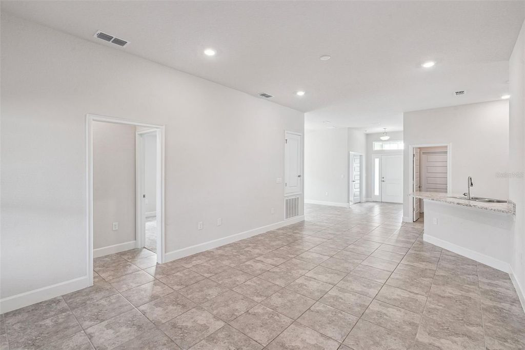 Photo of 2358 Friendly Confines Loop, Davenport, FL 33837 (MLS # O6376037)