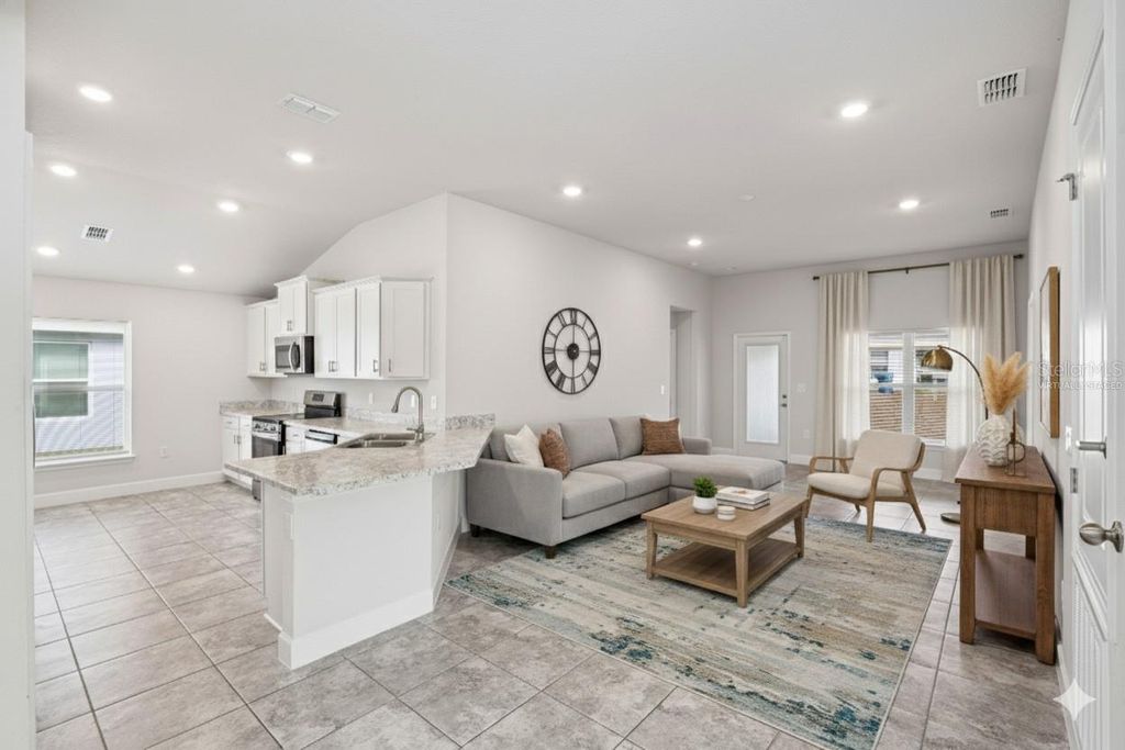 Photo of 2358 Friendly Confines Loop, Davenport, FL 33837 (MLS # O6376037)