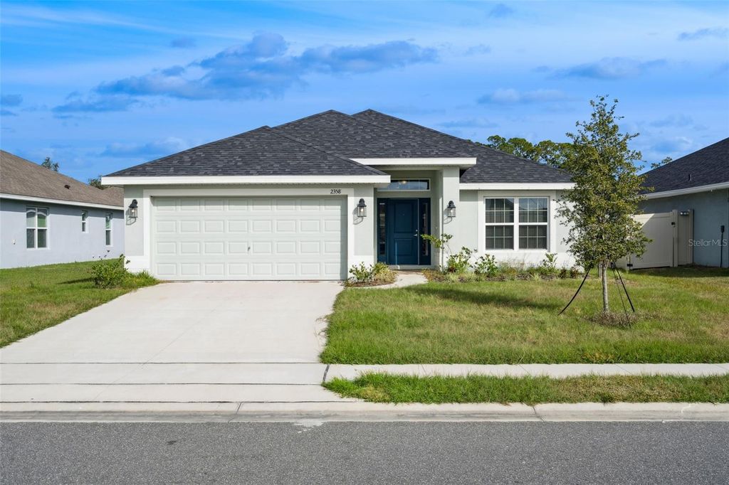 Photo of 2358 Friendly Confines Loop, Davenport, FL 33837 (MLS # O6376037)