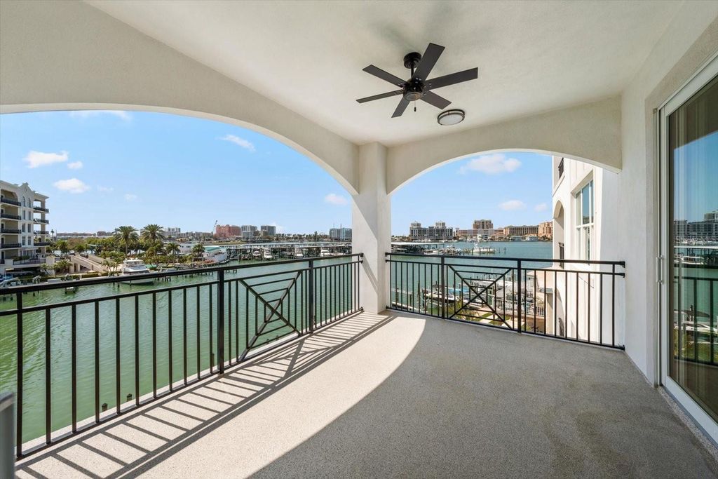 Photo of 211 Dolphin Point #302, Clearwater, FL 33767 (MLS # TB8485704)