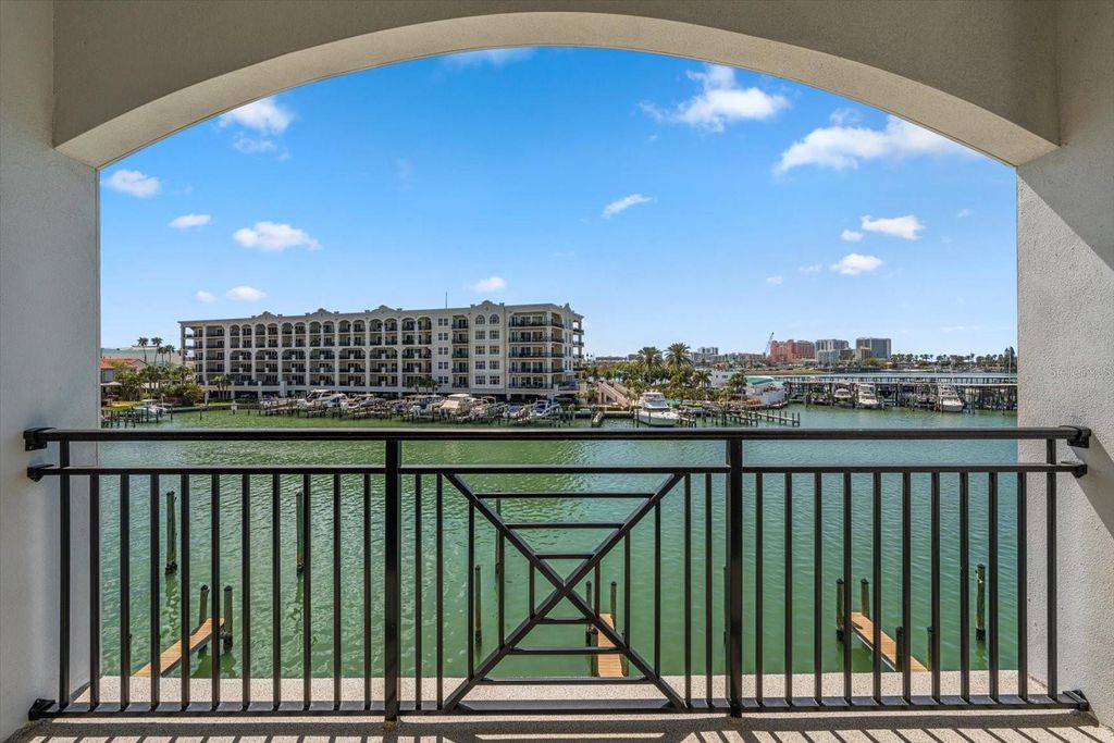 Photo of 211 Dolphin Point #302, Clearwater, FL 33767 (MLS # TB8485704)