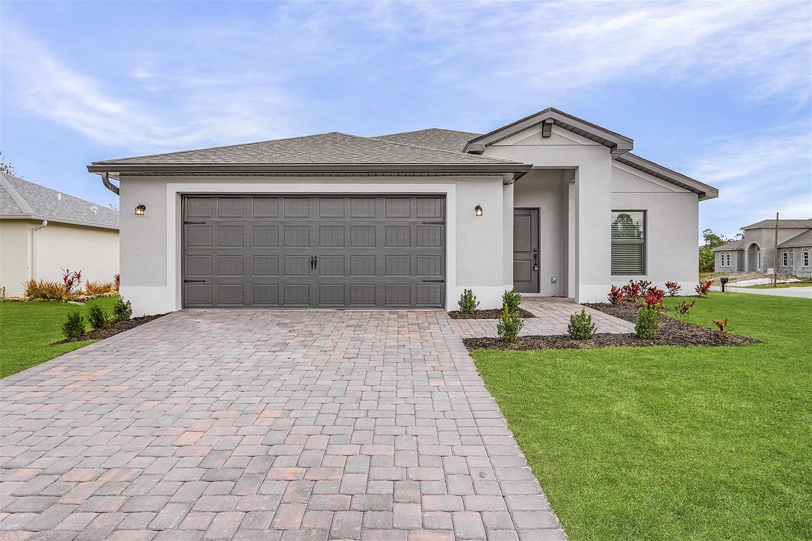 PRICE REDUCED!! MOVE IN READY! This stunning 3-bedroom, 2-bathroom home offers an open, airy layout with a spacious dining area, upgraded kitchen, and a large family room perfect for making lasting memories. Step outside to the covered back patio and enjoy a peaceful morning with a cup of coffee while taking in the sunrise. The master suite provides a private retreat, featuring an en-suite bathroom with a shower, dual vanities, and a walk-in closet. A perfect blend of comfort and style awaits