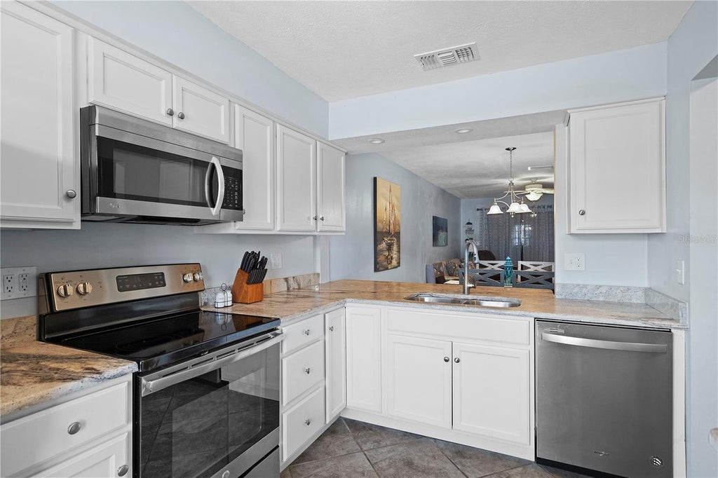 Photo of 340 Causeway Boulevard #104, Dunedin, FL 34698 (MLS # TB8552546)