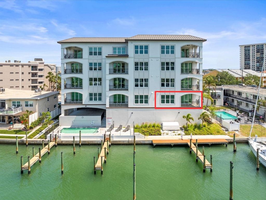 Photo of 211 Dolphin Point #201, Clearwater Beach, FL 33767 (MLS # TB8392573)