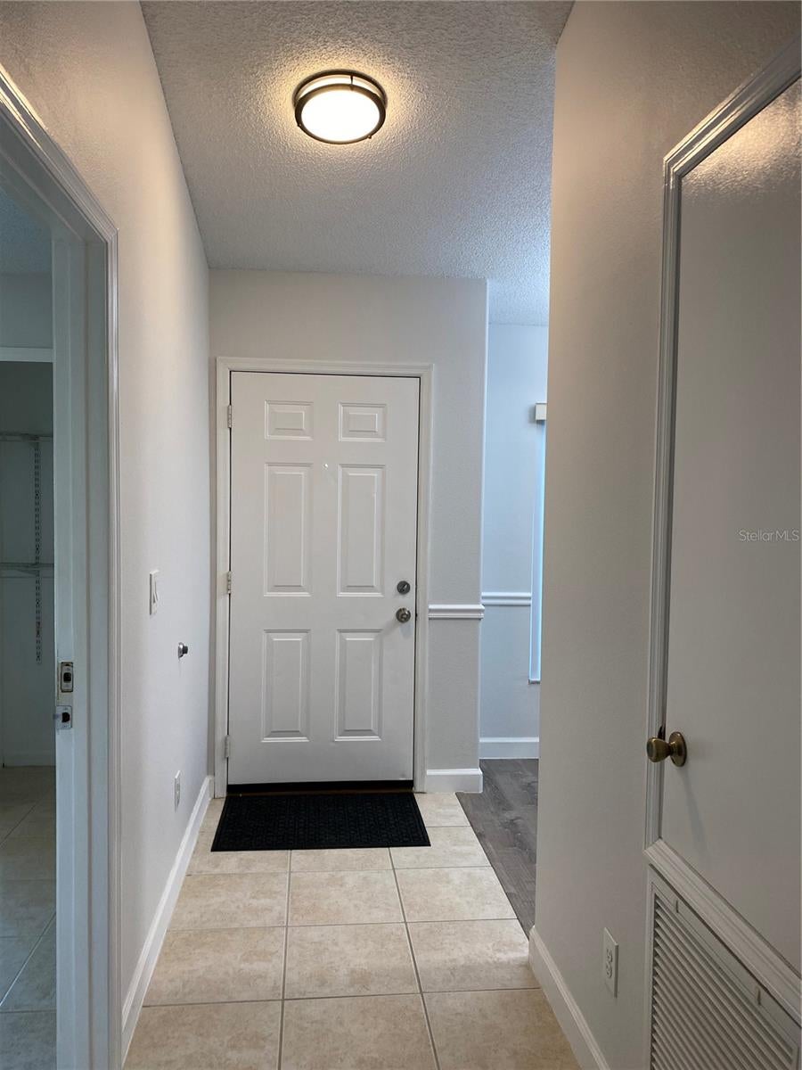 Photo of 13724 Riverpath Grove Drive, Orlando, FL 32826 (MLS # O6427961)