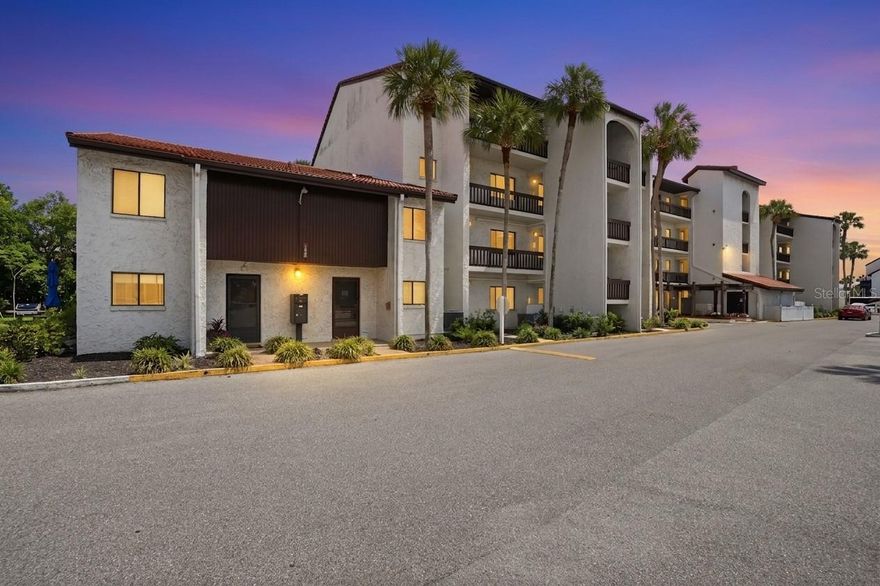 Enjoy the coastal Sarasota lifestyle just minutes from world-famous Siesta Key Beach! Located in the waterfront community of Castel Del Mare, this turnkey furnished 2-bedroom, 2-bath condo combines comfort, convenience, and scenic surroundings in one of Sarasota’s most desirable locations. Inside, the condo features over 1,000 sqft of space with an open living and dining area, laminate flooring, and direct access to the spacious glass-enclosed lanai overlooking lush greenery and the community tennis court. The updated kitchen is designed for both function and style, with solid surface counters, stainless steel appliances, generous cabinet storage, and tiled backsplash. The primary suite offers a spacious walk-in closet and private en-suite bath, while the secondary bedroom includes simple closet space and easy access to the second full bathroom. This residence is ready for immediate enjoyment as a full-time home, seasonal retreat, or investment opportunity. Castel Del Mare is a beautifully maintained intracoastal waterfront community featuring resort-style amenities including two heated pools, tennis courts, kayak storage and launch access,  a club house, grilling areas, walking paths, and scenic waterfront seating areas perfect for watching sunsets over Sarasota Bay. Residents also enjoy elevator access, assigned parking, and easy access to a variety of shopping, dining, and boating opportunities. Positioned just over the south bridge to Siesta Key, this location places you moments from powder-soft Gulf beaches, waterfront restaurants, marinas, and vibrant entertainment options. Whether enjoying a day at the beach, exploring nearby nature preserves, or dining along the water, this property delivers the ideal blend of relaxation and access!