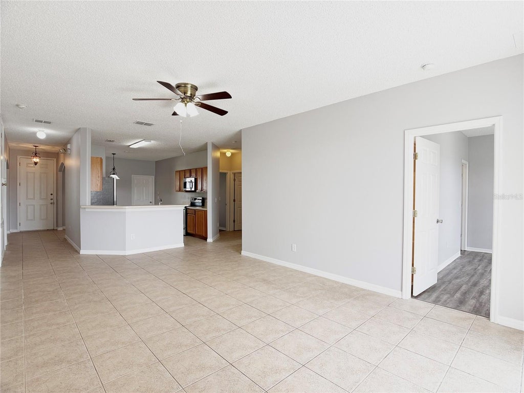 Photo of 117 Sunset View Drive, Davenport, FL 33837 (MLS # O6448449)