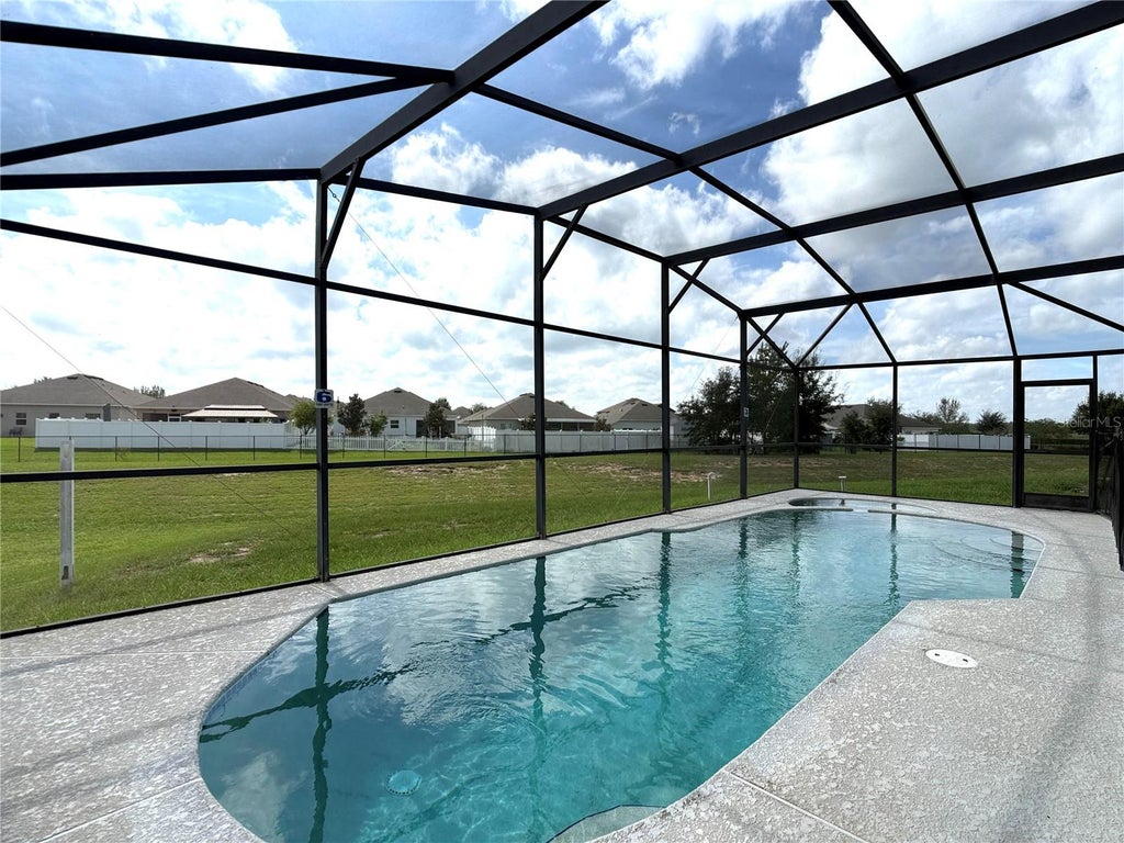 Photo of 117 Sunset View Drive, Davenport, FL 33837 (MLS # O6448449)