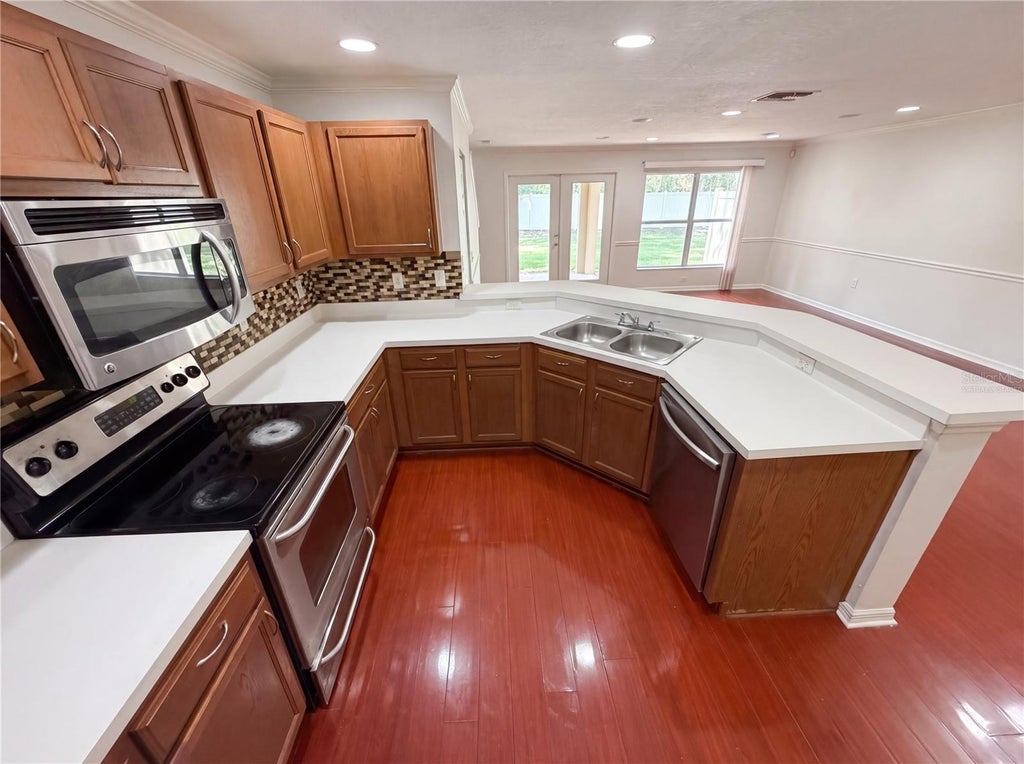 Photo of 2972 Royal Tuscan Lane, Valrico, FL 33594 (MLS # O6407610)