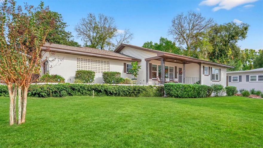 This stunning mid-century 2 Bedroom, 2 full/2 half bath home with possible third bedroom, offers amazing views of East Crooked Lake.  Enjoy the spectacular sunsets from your front porch!  This beautifully updated home features an inviting open floor plan and original hardwood floors.  The spacious kitchen has been thoughtfully remodeled with a large island, quartz countertops, and stainless-steel appliances; perfect for entertaining.  The primary and secondary bedrooms have en-suite baths and walk-in closets.  The bonus den/flex room offers versatility as a possible third bedroom, office, or as a music room like the current owners.  Recent 2025 upgrades include: New A/C, new septic tank and drain field, new sod, kitchen remodeled, primary bath remodeled, half bath remodeled, new interior and exterior paint including fence and shed, new attic insulation, new light fixtures and fans, new interior and exterior door handles, new stainless-steel refrigerator, new washer and dryer, and other updates.  Roof was replaced in 2015, water heater in 2023, and newer vinyl, double-hung, insulated windows.  This home is centrally located within minutes to both downtown Eustis and Historic Mount Dora.  Easy access to the 453/429 connector for a short commute to Orlando, airports, theme parks, and beaches on the east and west coast.  This truly is the place to be and the house to call home!  Don't miss out on this exceptional property, schedule a visit today!