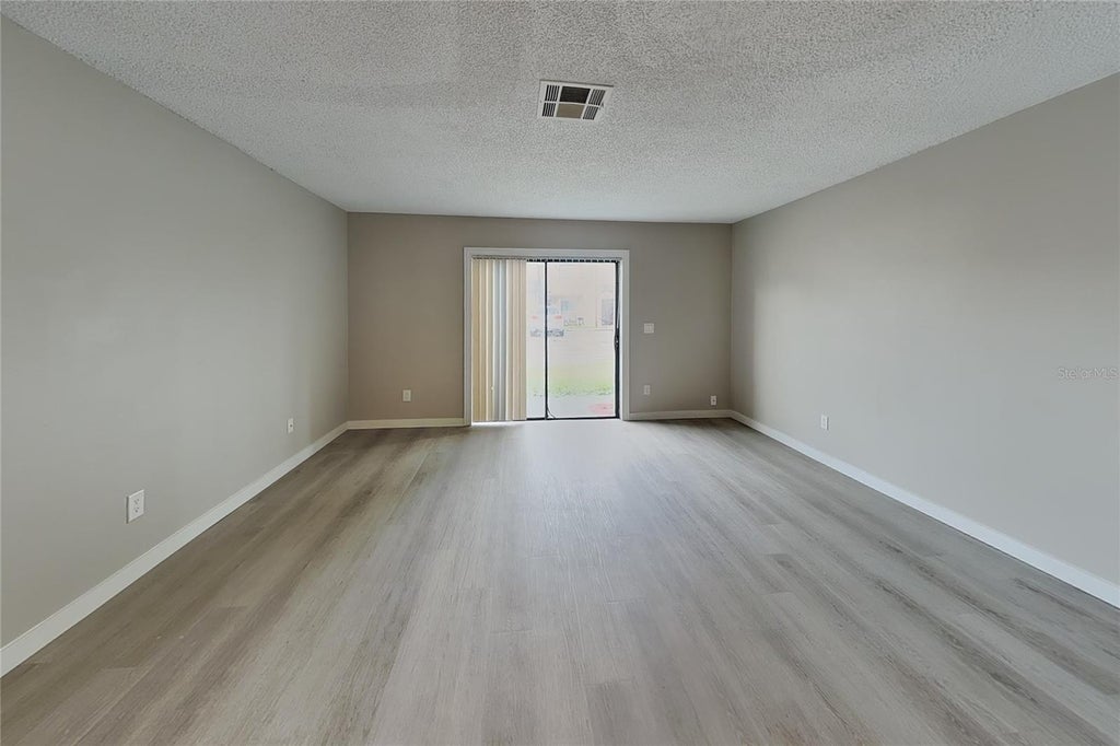 Photo of 133 Jones Lane #B, Kissimmee, FL 34743 (MLS # O6438662)