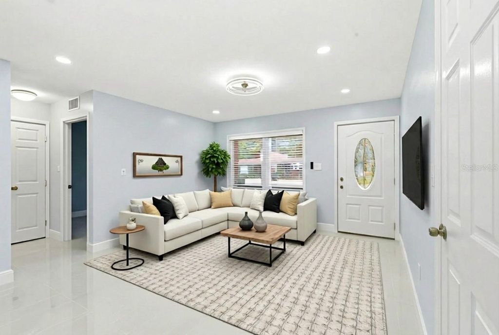 Photo of 915 Maydell Drive, Tampa, FL 33619 (MLS # TB8465437)