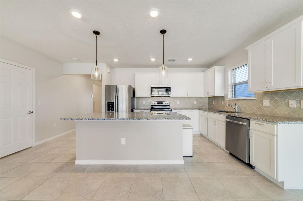 Photo of 783 Citrus Isle Drive, Davenport, FL 33837 (MLS # O6361240)