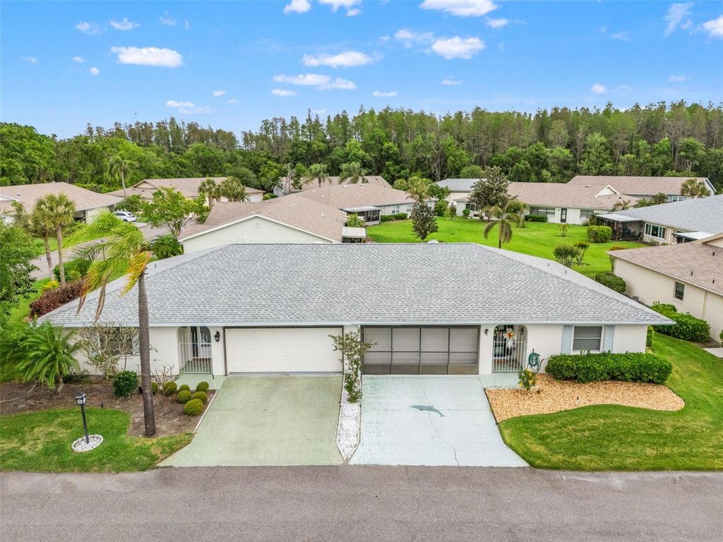 Photo of 2115 N Halcyon Drive, Sun City Center, FL 33573 (MLS # TB8496419)