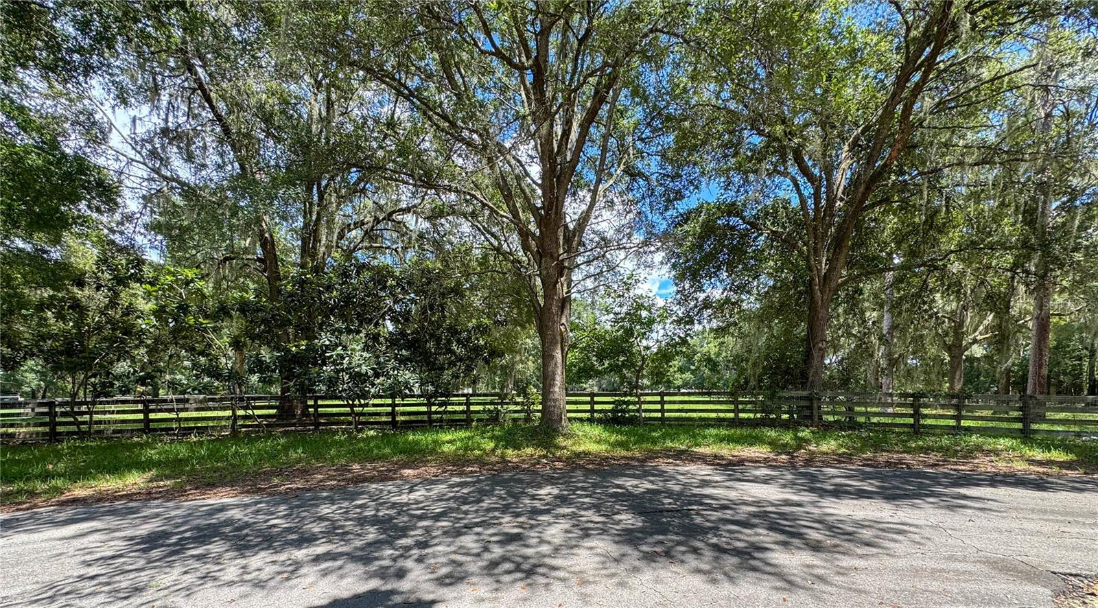 Must-See 2-Acre Buildable Lot in the Sought-After Farms of Kanapaha.
Discover your opportunity to build your dream home nestled at the end of a quiet cul-de-sac in the picturesque Farms of Kanapaha; this fully fenced 2-acre lot offers the perfect blend of privacy, peace, and convenience.
Horse lovers and outdoor enthusiasts will love the direct access to rideable trails that connect to miles of scenic paths winding throughout the community. Enjoy the tranquility of country living in a horse-friendly neighborhood, while still being just minutes from shopping, dining, top-rated schools, Shands Hospital, the VA, and the University of Florida.
Bring your vision and create your private haven in one of Gainesville’s most desirable equestrian communities.
