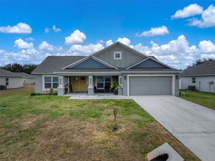 Welcome to this beautifully built 2023 concrete block home located in the desirable Lake Byrd Shores community. This spacious 3-bedroom, 2-bath residence offers modern design and quality construction throughout. Step inside to soaring tall vaulted ceilings and an open, airy layout with tile flooring throughout the main living areas, creating both elegance and easy maintenance. The kitchen is highlighted by granite countertops, offering both style and durability, and flows seamlessly into the main living space—perfect for everyday living and entertaining. The home also features a versatile den, ideal for a home office, playroom, or additional living area. The large master suite provides a relaxing retreat with a spacious walk-in closet and an oversized master bathroom designed for comfort and convenience. All secondary bedrooms are generously sized, offering plenty of room for family or guests. Enjoy indoor-outdoor living with a large backyard and covered lanai—ideal for entertaining or relaxing evenings at home. The oversized two-car garage provides ample space for vehicles and storage, and the laundry room is conveniently located inside the home. As part of the Lake Byrd Shores community, residents enjoy exclusive boat ramp access to Lake Byrd and use of the community gazebo—perfect for family gatherings and special events. This move-in-ready home combines modern comfort, functional space, and waterfront community living.