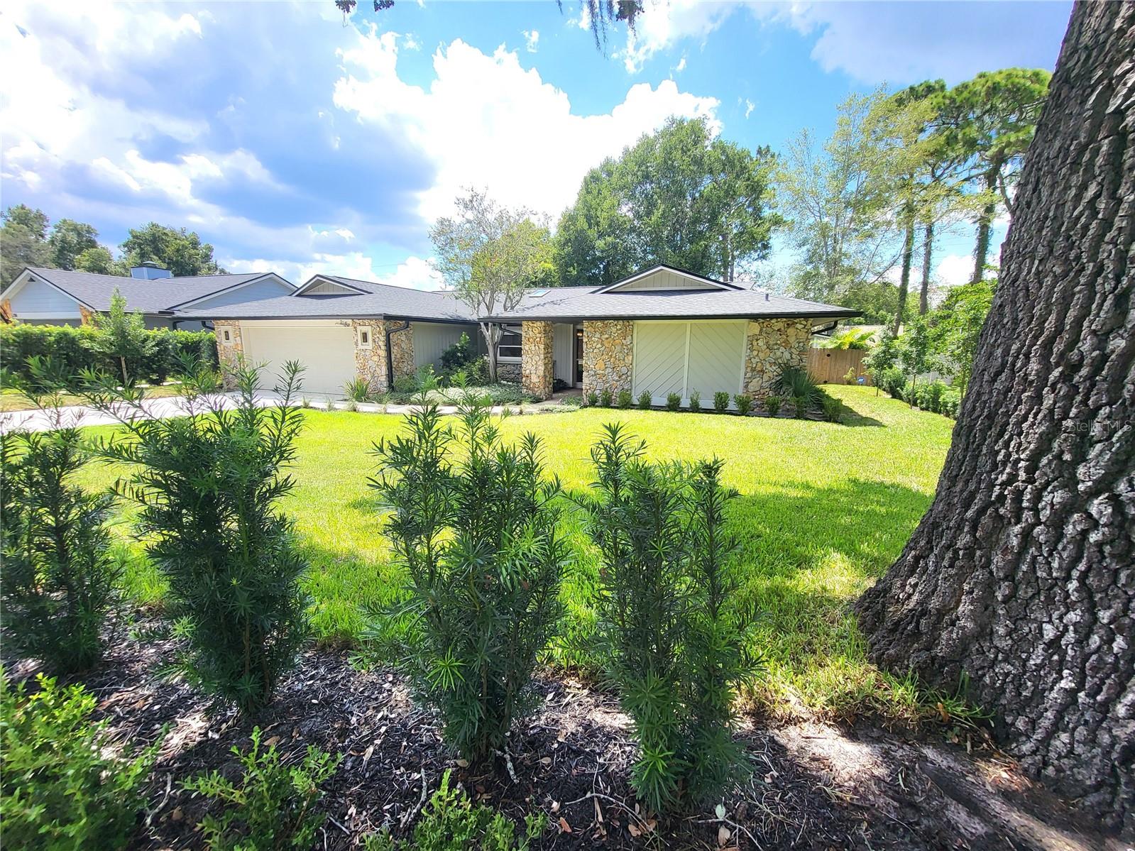 The ONE you have been waiting for! This POOL home has been renovated over the last six years to absolute STUNNING perfection. As you drive up to the property, you are welcomed with breathtaking lush landscaping looking just like a cover of a magazine. The custom woodworking is everywhere and high end finishes include tall modern square baseboards, level 5 drywall throughout and master carpenter unique touches throughout. Beautiful wood floors welcome you into this inviting foyer and flows right into this custom designed kitchen with two tone cabinets, quartz countertops and marble backsplash, no expense was spared in this kitchen. High end appliances complete the look. The primary suite is oversized and include a brand new bathroom and a custom closet that is sure to impress! The lighting throughout this home is phenomenal with LED three inch can lights throughout accenting the spaces and offering an unparalleled look in this charming home. Step into this big screened porch with a brick paver floor overlooking this private fenced in backyard adorned with a massive sparkling pool with two impressive fountains. A cool custom shed offers space for all your gardening needs leaving the amazing garage with a built in shelves and work area available for your homeowner projects. A quarter acre lot offers an expansive homesite to enjoy this backyard paradise. Rood replaced in 2019. This home is sure to impress!