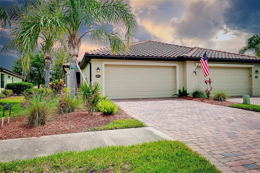PRICE CHANGE!  CURRENT OWNER WILL PAY YOUR HOA FEES FOR THE 1ST 6 MONTHS. Stunning Upgraded Villa in Gran Paradiso, Venice, Florida
Discover the perfect blend of elegance, comfort, and convenience with this beautifully upgraded 2-bedroom villa, featuring a versatile den that could serve as a 3rd bedroom. Located in the sought-after, Tuscany-inspired gated community of Gran Paradiso, this home offers resort-style living with access to world-class amenities and the vibrant lifestyle of Wellen Park just minutes away. Home Highlights 2 Bedrooms + Den (Possible 3rd Bedroom) Primary Bath: Completely remodeled with a custom large walk-in tiled shower featuring frameless glass, custom mirrors, and upgraded hardware. Second Bath: Fully renovated with a new walk-in tile shower, French drains, and upgraded plumbing. Kitchen Upgrades: Upgraded stainless steel dishwasher, Fridge and double oven range, sink, countertops, stylish backsplash, and a new washer and dryer. Outdoor Oasis: Fenced backyard with a scenic water view.  Extended paver lanai with a hurricane screen for added protection. Tinted glass windows for energy efficiency on rear of Villa.  Garage & Entry: Insulated garage door for improved energy efficiency.  Screened front entryway for added privacy and airflow.  Custom Landscaping: Beautifully designed for curb appeal. Open Floor Plan: Spacious layout with separate living room. Breakfast bar for casual dining and entertaining. Gran Paradiso – Resort-Style Living
Located in Venice, Florida, Gran Paradiso offers a luxury lifestyle with exceptional amenities: Resort-Style Pool & Spa, 24-Hour Fitness Center, Tennis and Pickleball Courts, Billiards Room and Library, Elegant Clubhouse with social events and activities.  Miles of walking and biking trails, Maintenance-free landscaping, Wellen Park – Vibrant and Growing Just minutes from your door, Wellen Park offers a dynamic lifestyle with Dining & Shopping: Trendy restaurants, boutique shops, and a farmers' market. Atlanta Braves Spring Training Facility: Catch a game or enjoy community events. Healthcare & Wellness: New HCA Emergency Room opening soon for immediate care needs, Sarasota Memorial expanding with two new hospitals for state-of-the-art healthcare access. Prime Location: Convenient Access: Close to I-75 for easy commuting. Beaches & Outdoor Recreation: Just a short drive to Gulf beaches, parks, and nature preserves. Shopping & Entertainment: Minutes from dining, shopping, and entertainment in downtown Venice and North Port. This upgraded villa offers the best of Florida living – modern updates, resort-style amenities, and a prime location. Schedule your private showing today and experience the lifestyle you’ve been dreaming of!