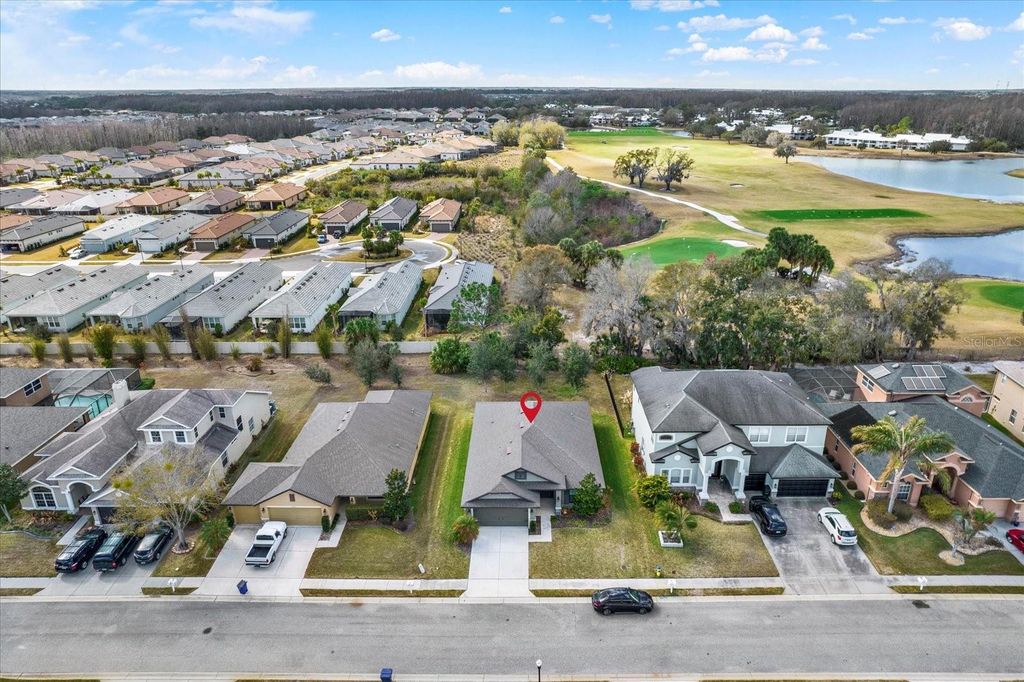 Photo of 4733 Royal Birkdale Way, Wesley Chapel, FL 33543 (MLS # TB8477678)