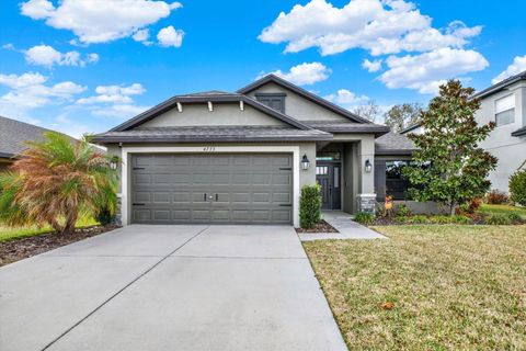 Photo of 4733 Royal Birkdale Way, Wesley Chapel, FL 33543 (MLS # TB8477678)