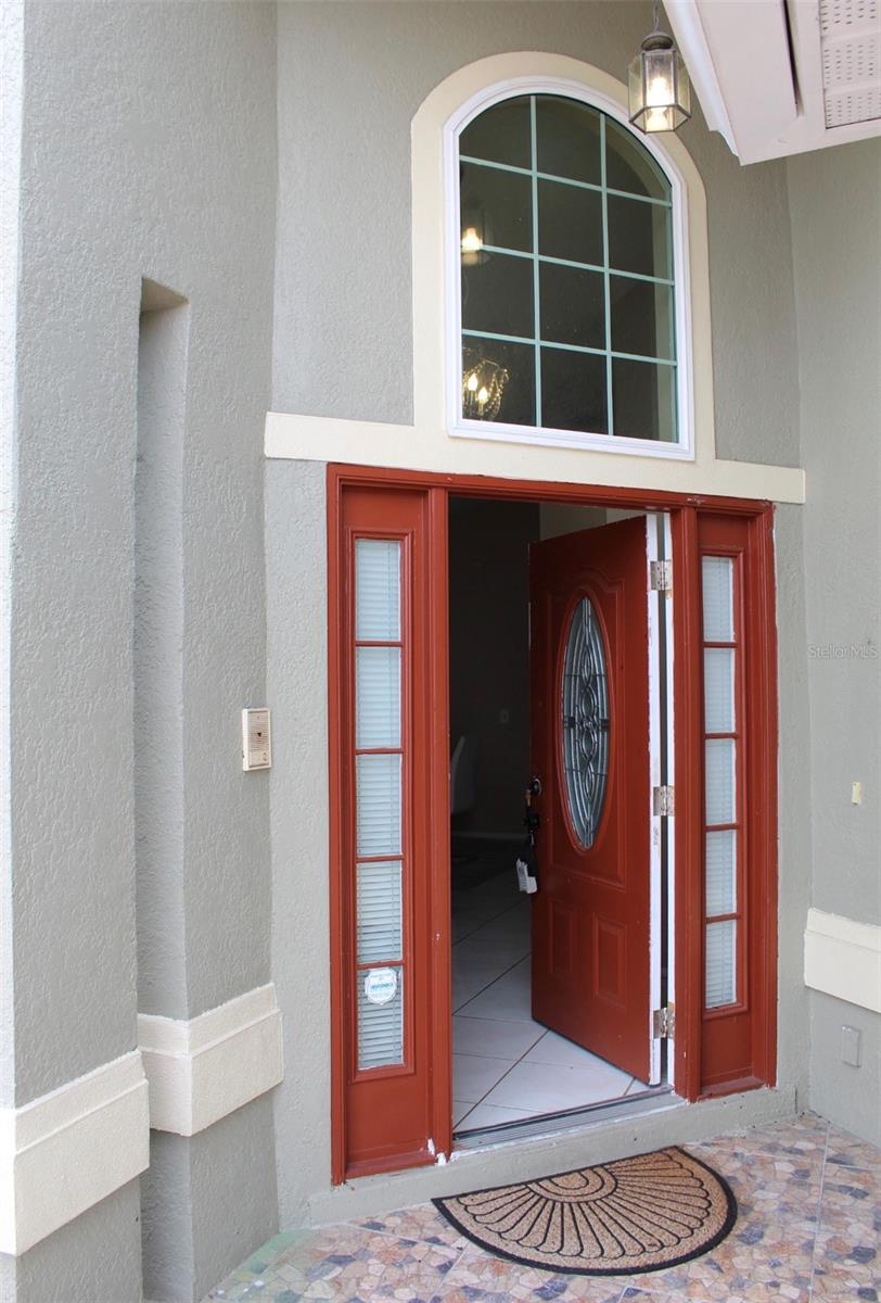 Photo of 223 Lake Davenport Estates Drive, Davenport, FL 33897 (MLS # O6442483)