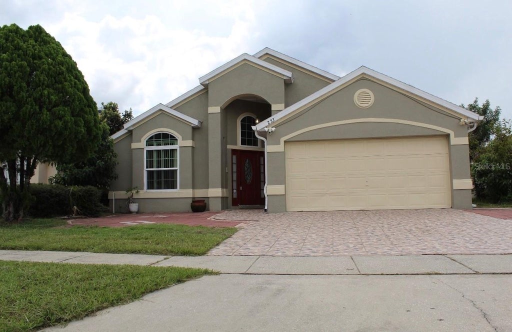 Photo of 223 Lake Davenport Estates Drive, Davenport, FL 33897 (MLS # O6442483)