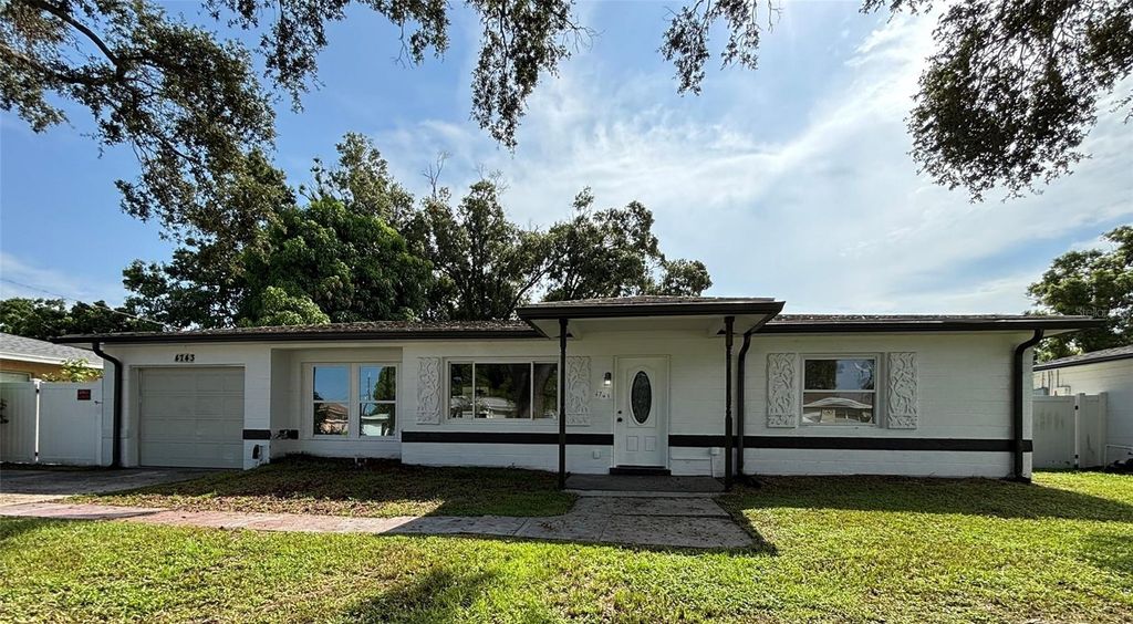 Photo of 4743 Lake Charles Drive N, Kenneth City, FL 33709 (MLS # TB8414600)