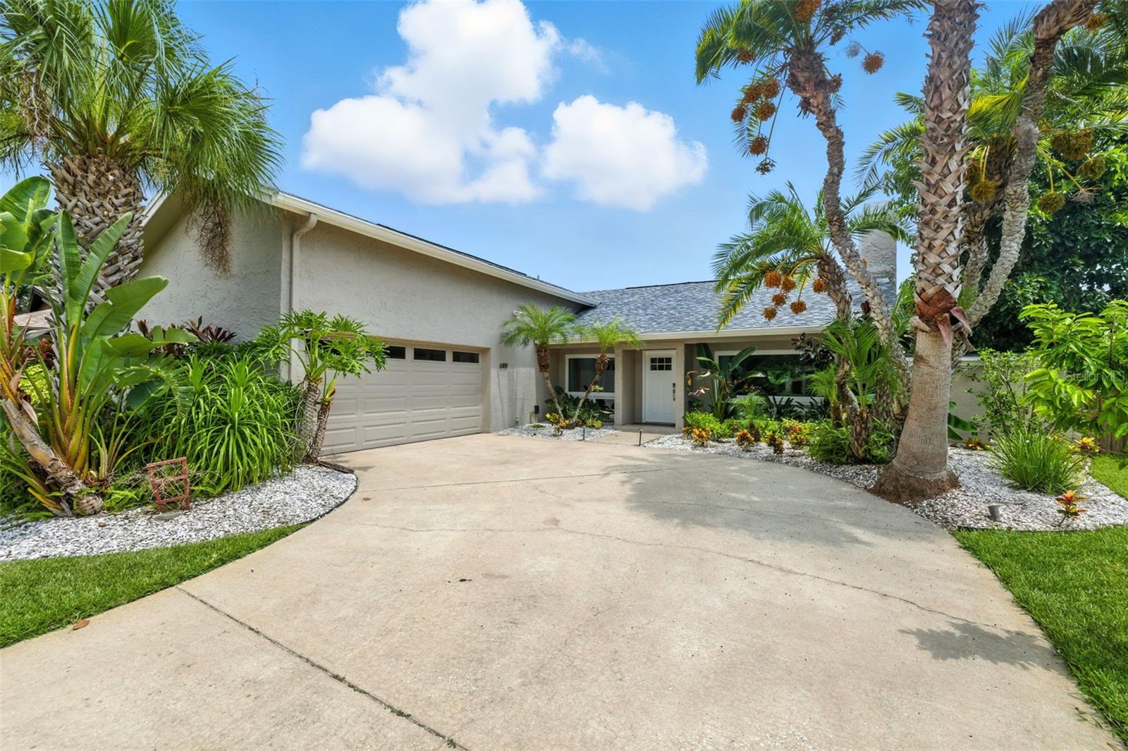Rare find offering an assumable mortgage at 3.5 percent for qualified buyers! Welcome to 6109 Schooner Way, an updated waterfront home in gated Bay Port with 76 ft of canal frontage and direct bay access. Inside, you'll find vaulted ceilings and a stone fireplace that anchor the living space. The kitchen offers granite counters, stainless appliances, breakfast bar, and wet bar with a wine fridge, while a bright Florida room overlooks the private pool and water. The primary suite features a renovated bath with quartz vanities, soaking tub, and glass shower. Outside, enjoy a resurfaced saltwater pool (2023), screened lanai, hot tub, and new dock with sun deck and 11,000 lb boat lift. This home has seen extensive updates and lives up to the definition of move in ready. Updates include breaker panel & hot tub wiring (2020), storm-rated windows (2021), doors (2022), new pavers & dock (2023), plus a new roof, water heater, pool pump, and salinity system (2024). Bay Port also offers pickleball courts and an optional yacht club membership. Close proximity to Berkeley Prep, TPA, Downtown Tampa, and world class Clearwater & St. Pete beaches. More importantly this home did not flood during recent hurricanes! Schedule your private tour now.