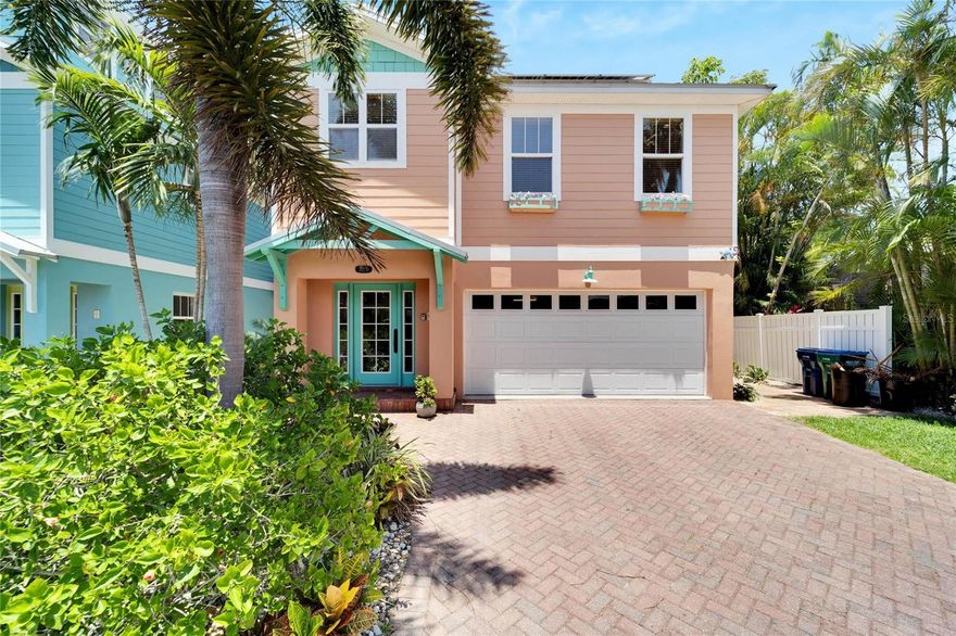 The epitome of coastal charm, this beautiful tropical oasis is a perfect slice of paradise! Featuring an open kitchen and family room area with gracious French doors leading to a lovely balcony that overlooks a Zen like backyard. Spend relaxing days savoring a beautiful paver patio with  private saltwater, heated pool surrounded by lush, tropical foliage. Retire in the evening to your spacious master bedroom ensuite with dual sinks, soaking tub and walk-in shower. Not only is this property beautiful, but it is also smart! Elevated floor plan provides worry free living, solar energy heats the pool and provides additional power to the home and the central vacuum system makes cleaning a breeze.  The oversized garage has an epoxy floor with ample storage, built in refrigerator and bathroom. Only two blocks from the beach, and close to shops and fabulous island restaurants, this fresh and lovely home is zoned for weekly rentals and will be an incredible investment opportunity, a beloved Anna Maria Island residence or enjoyed as both at your discretion.