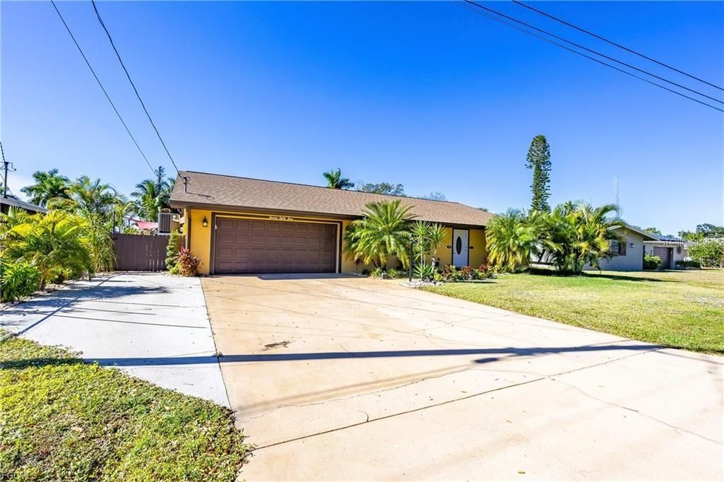 Photo of 1383 Harbor View Drive, North Fort Myers, FL 33917 (MLS # C7519388)