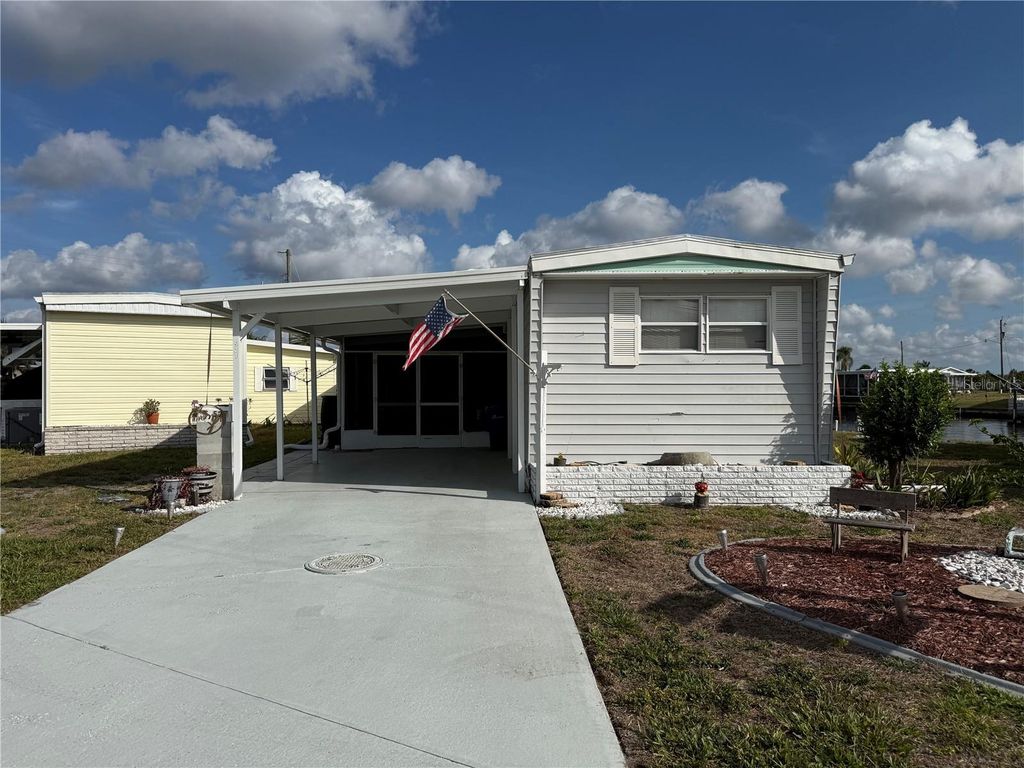 Photo of 527 Blackburn Boulevard, North Port, FL 34287 (MLS # D6147240)