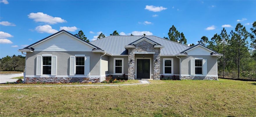 Pre-Construction. To be built. Property is currently a vacant lot, go and show anytime. This pre-construction Bedford 3 Model by Wettermann Homes includes both the land and the beautifully designed home to be built on it. The price also encompasses budgets for flooring, cabinets, tiling, and countertops, allowing buyers to personalize their selections at our trade partner's design showroom. This stunning home features an open floor plan, granite or select quartz countertops, 42" upper slow-close cabinets with stacked uppers, slow-close cabinet drawers, kitchen tile backsplash, floor-to-ceiling tile in all bathroom tubs and showers, 10’ ceilings throughout, 5-1/4 crown molding in living, kitchen, and master bedroom, 5-1/4 base molding, custom closet organizing systems in the master walk-in closet, 16 SEER high-efficiency variable speed HVAC system, masonry core fill insulation, Energy Star stainless steel appliances, Energy Star vinyl insulated Low-E windows, energy-efficient LED lights throughout, water filtration system, epoxied garage floor, Wi-Fi-enabled thermostat, and a full paver driveway. Buyer will be able to select cabinets, flooring, countertops, paint colors, and bath tile. Pictures are of a previous build and are for reference only. Construction financing available with our preferred lender and ask about qualifying for a low rate and possible rate buy-downs to lower your payment. Property is currently a vacant lot, go and show anytime.