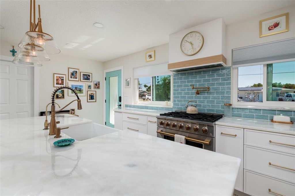 Photo of 9298 Sun Isle Drive NE, St Petersburg, FL 33702 (MLS # TB8490371)